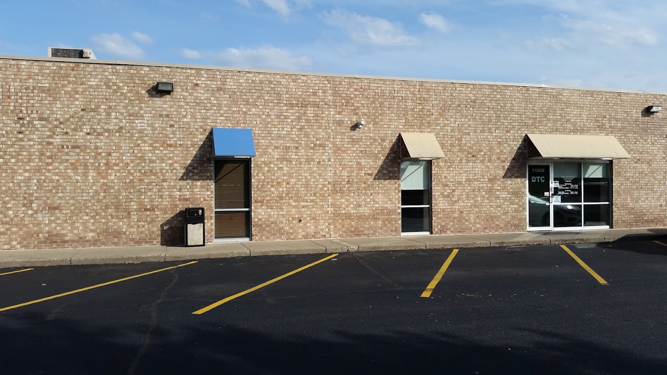 Facility exterior with entrance and accessible parking.