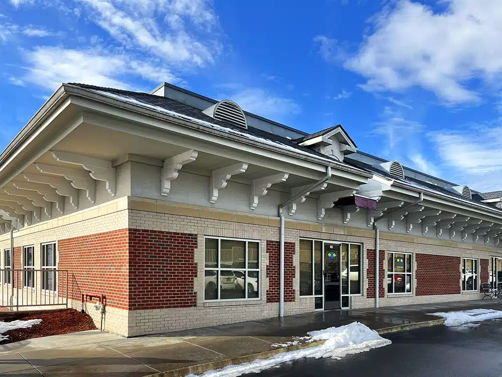 Exterior of rehab facility with brick facade and entrance