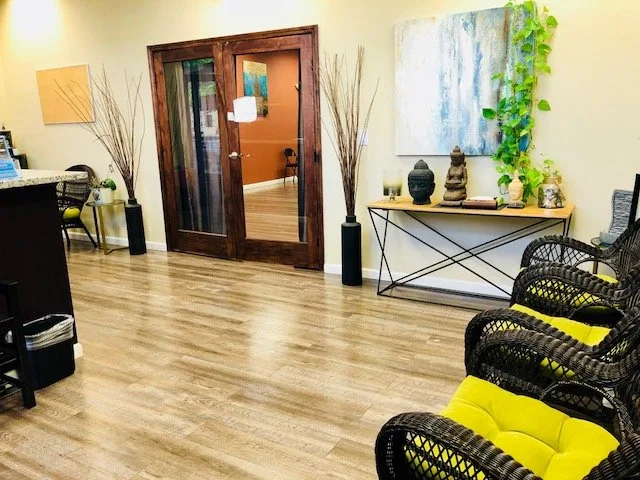 Rehab reception with wicker chairs and decor