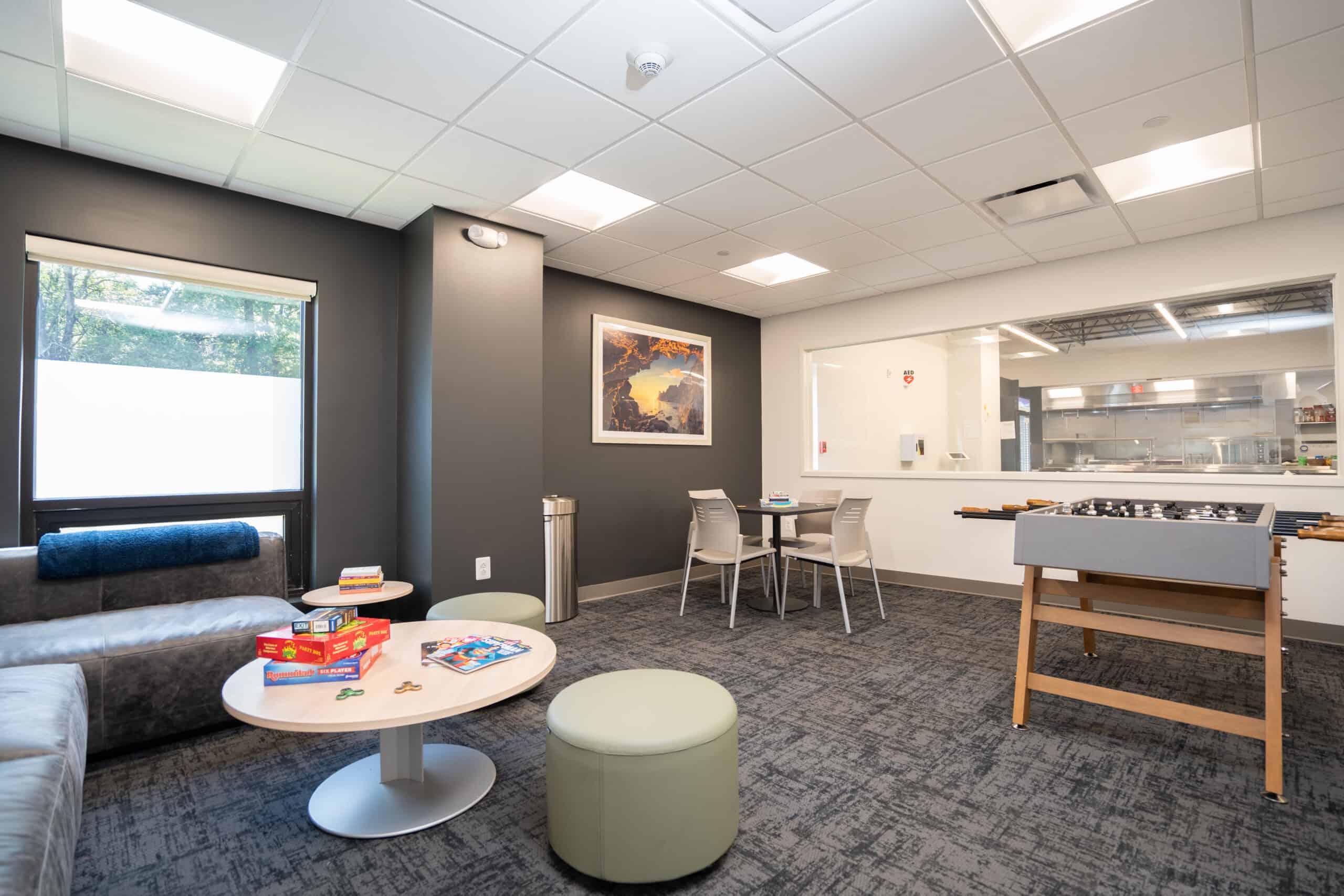Recreational room with foosball, board games, and lounge seating