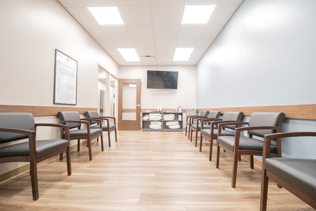 Group counseling room with chairs and educational posters