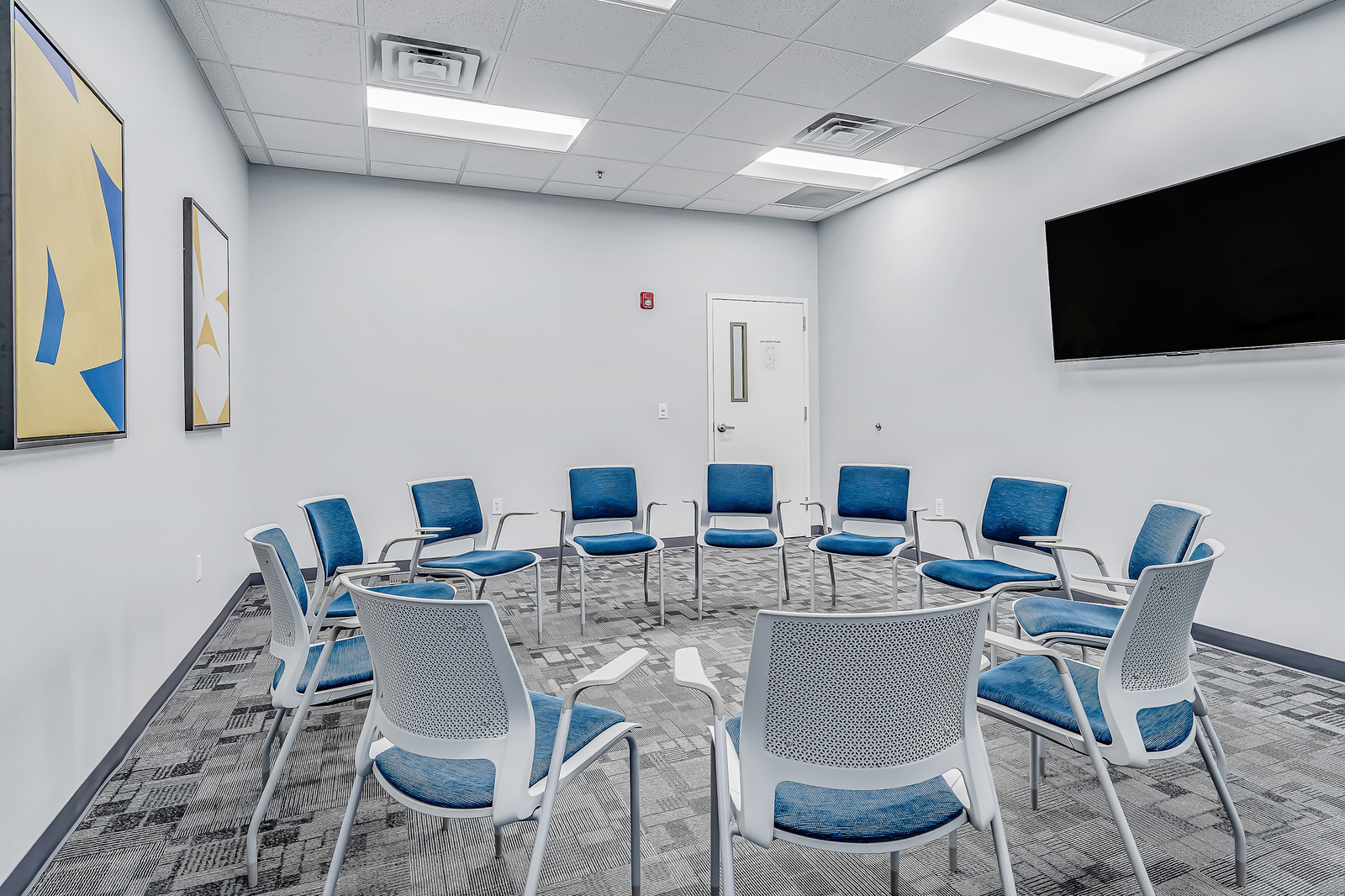 Therapy room with chairs arranged in a circle