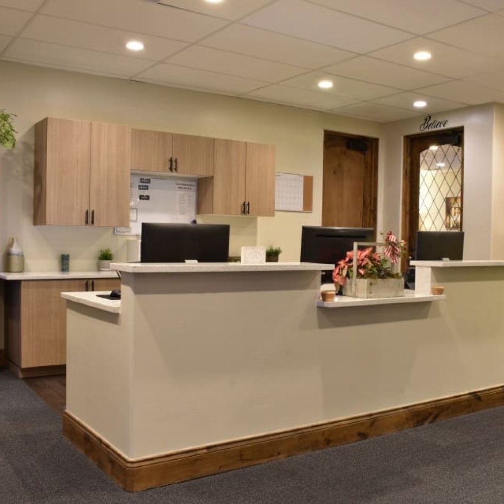 Reception desk with monitors and seasonal decorations