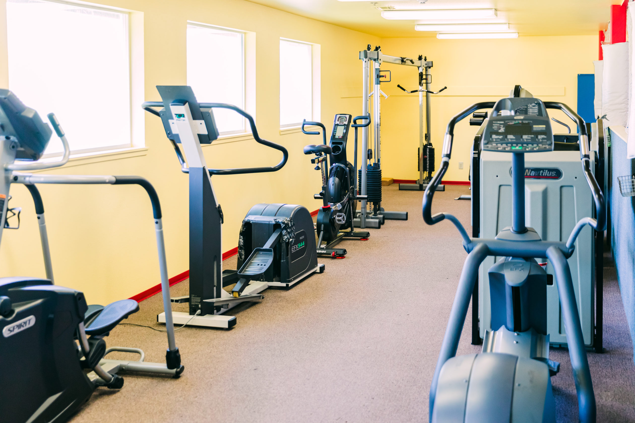 Gym with exercise bikes and strength machines