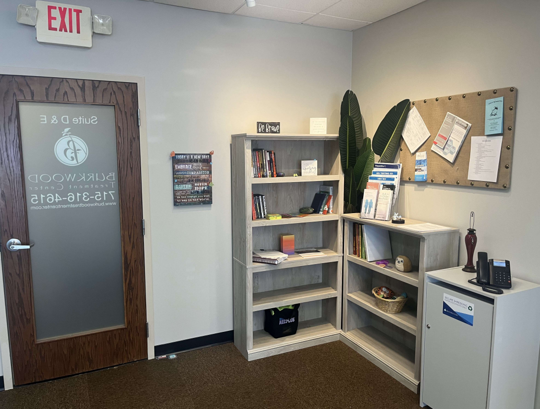 Reception area with resource shelves and information board