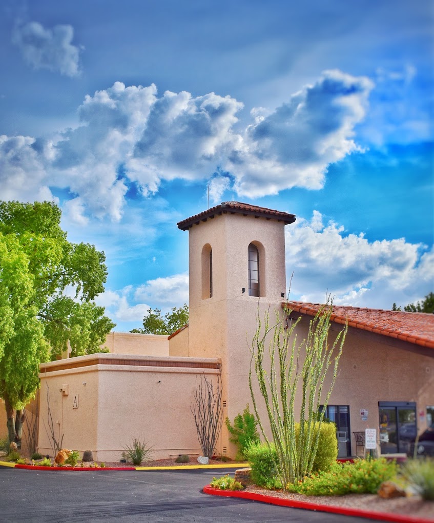 Facility driveway with a bell tower.