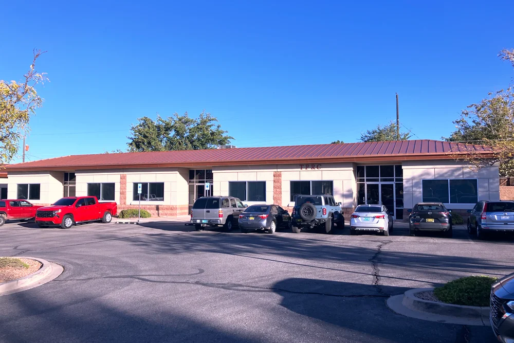 Front exterior of recovery center building with parking lot