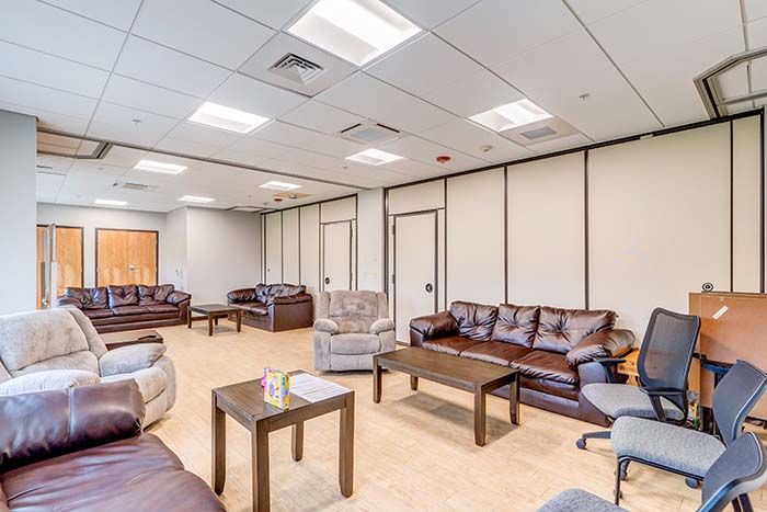 Room with leather couches and chairs