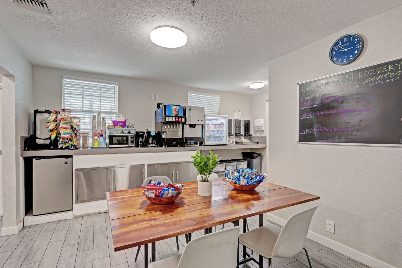 Snack bar with drinks, snacks, and microwave station