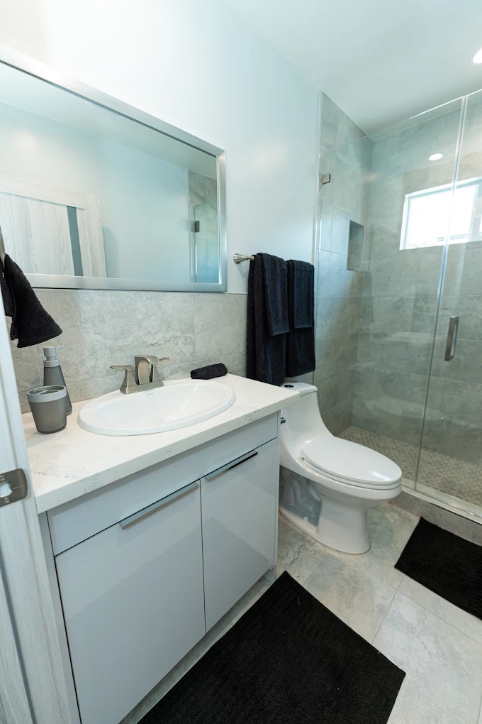 Modern bathroom with glass walk-in shower