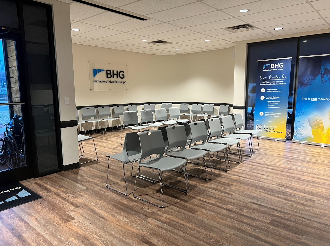 Group meeting room with rows of chairs for sessions