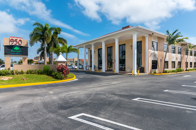 Facility exterior with signage and accessible parking.