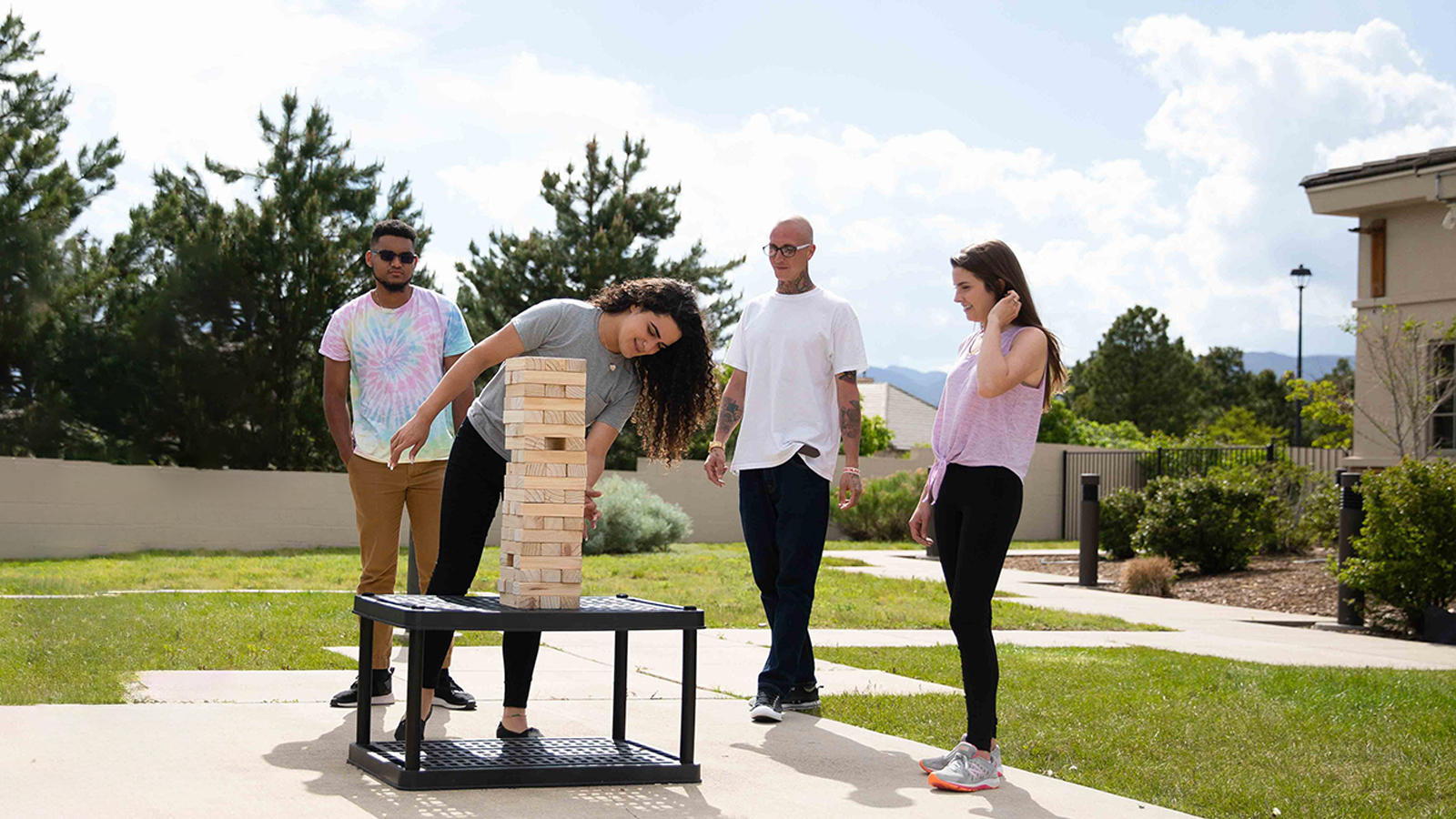 Outdoor group game of giant Jenga.