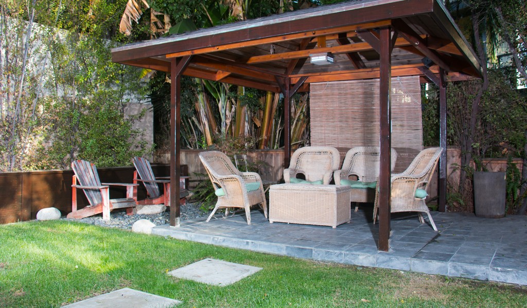 Shaded gazebo with seating.