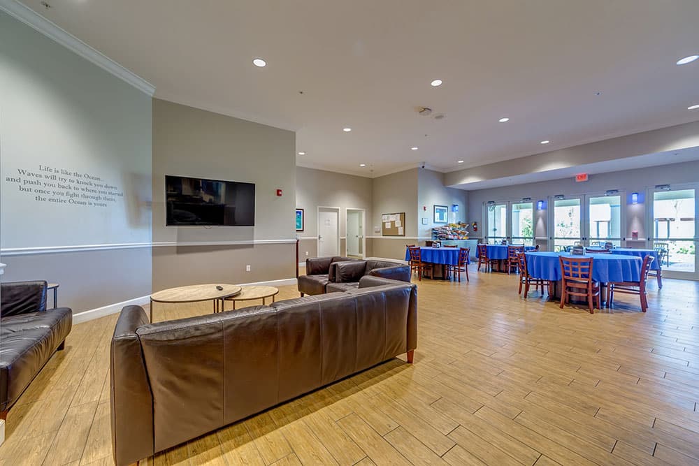 Lounge area with couches and dining tables