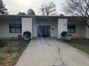 Brick outpatient building with white trim and entry