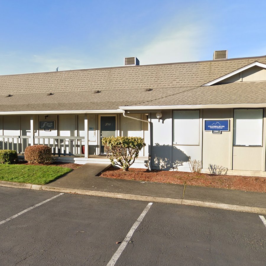 Exterior of Recovery Works NW with signage and walkway